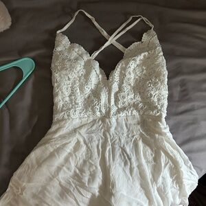 Lulu's White Lace Romper with Crisscross Straps and Open Back